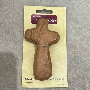 Hand carved olive wood cross. Hand crafted. From Bethlehem. Hold in hand size.